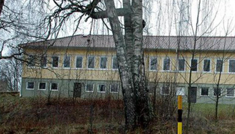 Ombyggnad av fastigheter till lägergård, Hulabäck